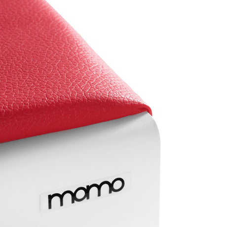 Momo Professional Manicure Hand Rest Red - displayed in a styled studio photograph