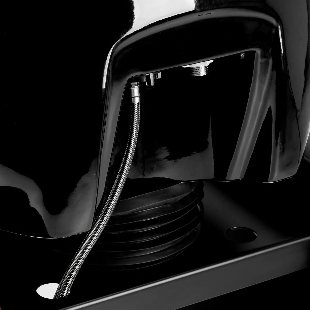 Adjustable Omega Aqualina basin mount and braided water hose detail