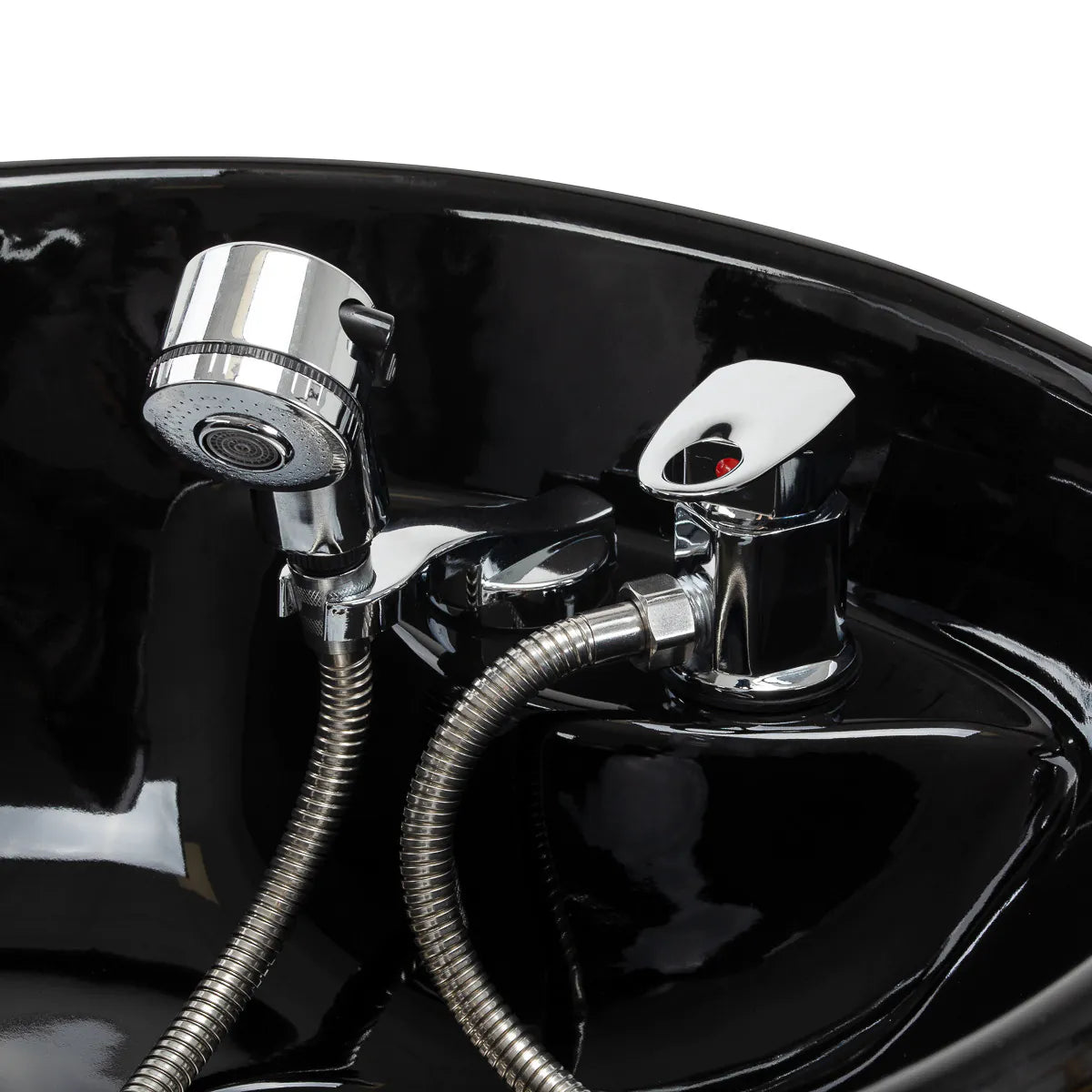 Chrome mixer tap and handheld shower head inside the Omega Aqualina basin