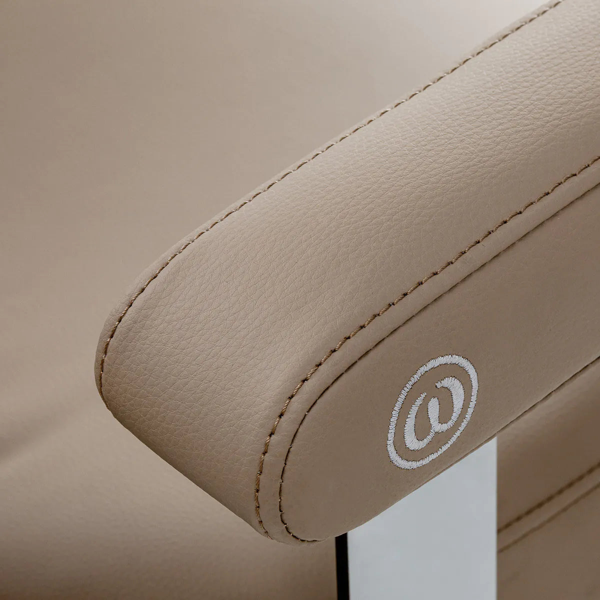 Omega Hairdressing Chair Astra Beige - close-up of the upholstery and construction details