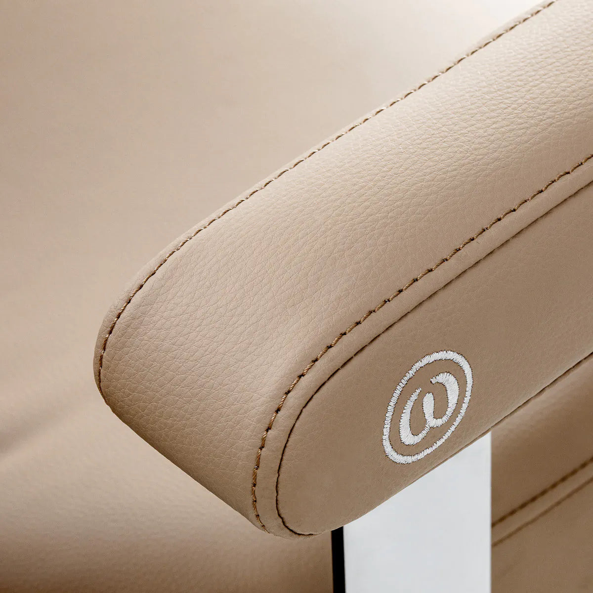 Omega Hairdressing Chair Astra Plus Beige - close-up of the upholstery and construction details