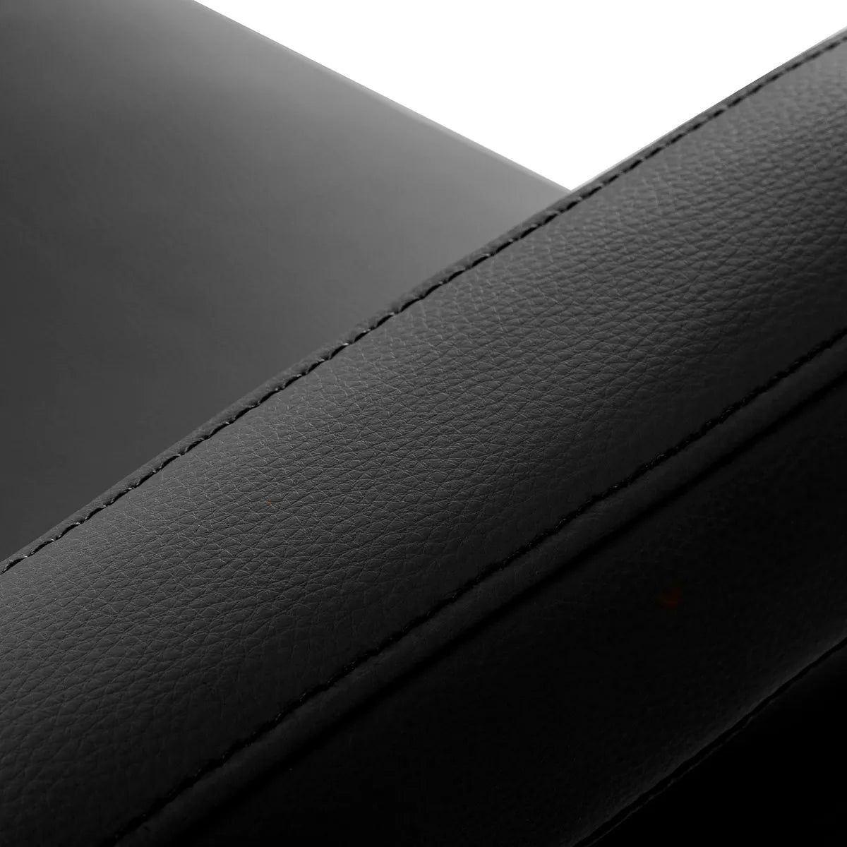 Omega Hairdressing Chair Astra Plus Black - close-up of the upholstery and construction details