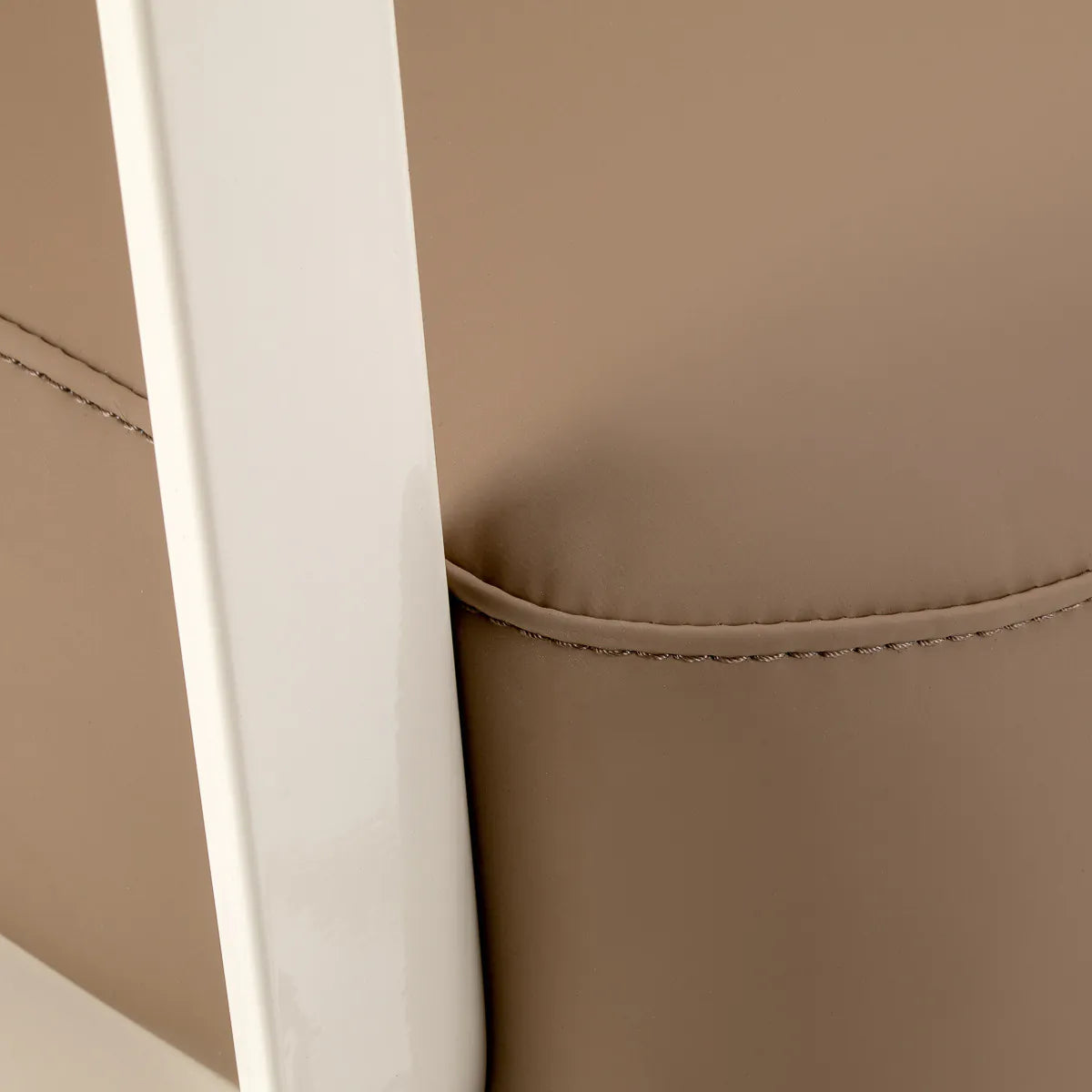 Omega Hairdressing Chair Aurora Light Brown - close-up of the upholstery and construction details
