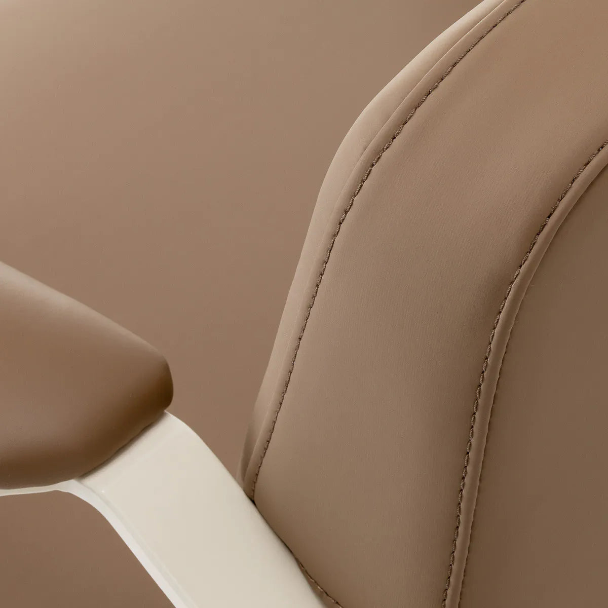 Omega Hairdressing Chair Aurora Light Brown - close-up of the upholstery and construction details