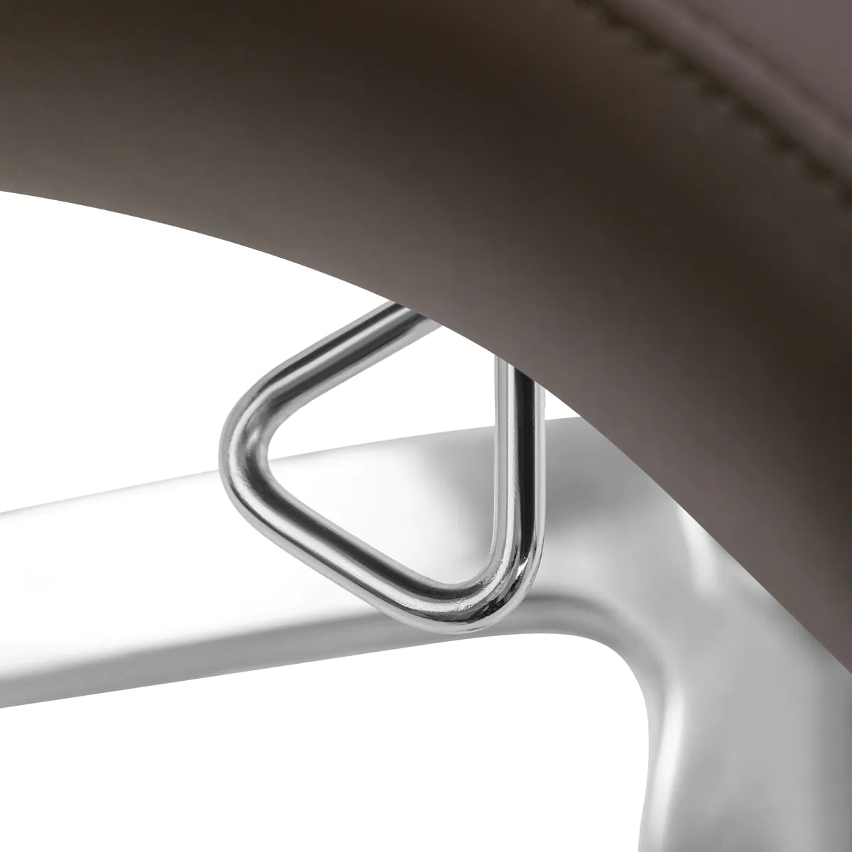 Omega Supremo Swivel Stool Brown & Silver - displayed in a professional treatment-room setting