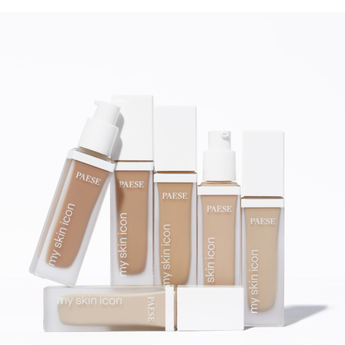 Paese My Skin Icon Mattifying Foundation - foundation tube displayed over matching shade swatches
