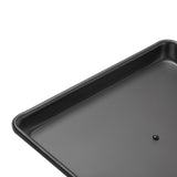 Pro Ink 121 Tattoo Trolley Black - displayed in a professional treatment-room setting