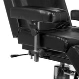 Pro Ink 210H Hydraulic Tattoo Chair Black - displayed in a professional treatment-room setting
