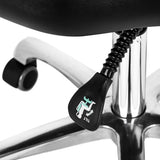 Pro Ink 973 Tattoo Chair Black - displayed in a professional treatment-room setting