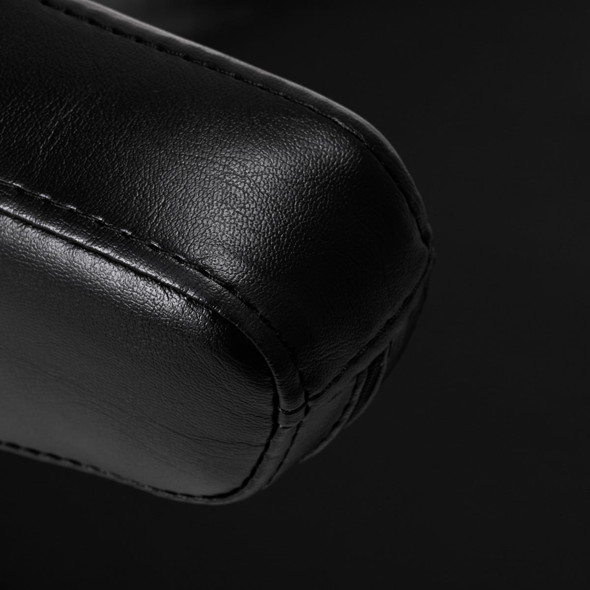 Pro Ink 973 Tattoo Chair Black - close-up of the upholstery and construction details