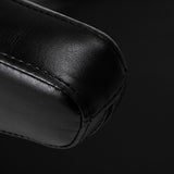 Pro Ink 973 Tattoo Chair Black - close-up of the upholstery and construction details