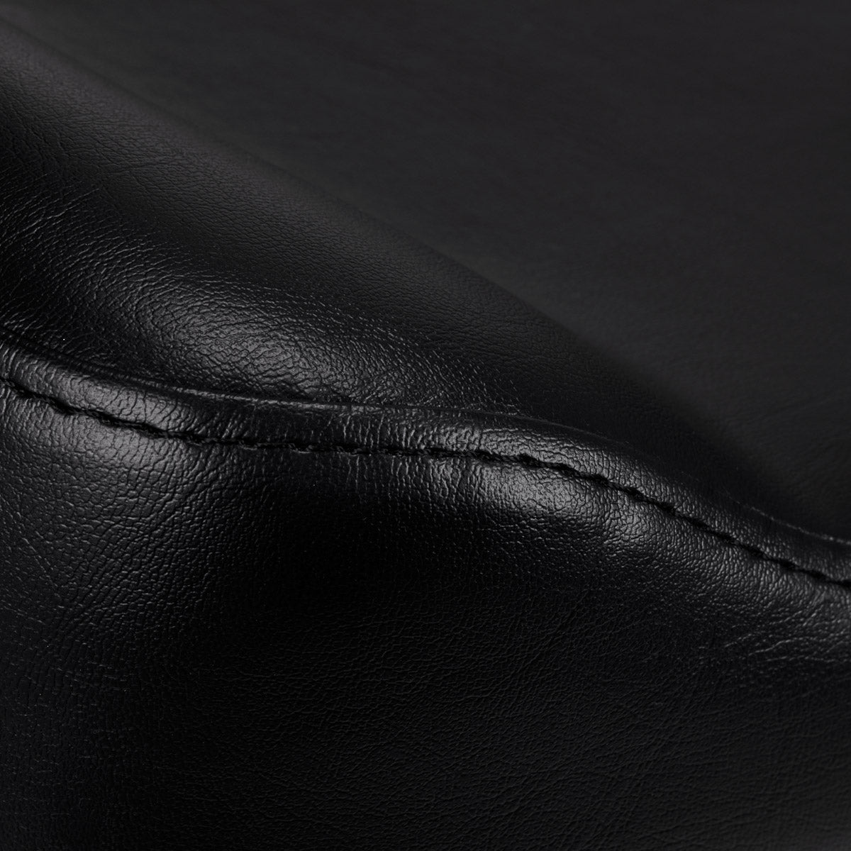 Pro Ink 973 Tattoo Chair Black - close-up of the upholstery and construction details