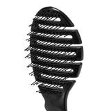 Close-up of the black Roxie Collection Flexible Detangling Brush bristles, designed for gentle detangling and reduced hair breakage.