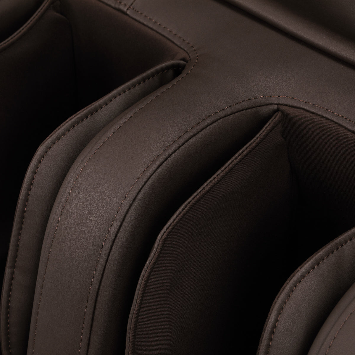 Sakura Comfort Plus 806 Massage Chair Brown - close-up of the upholstery and construction details