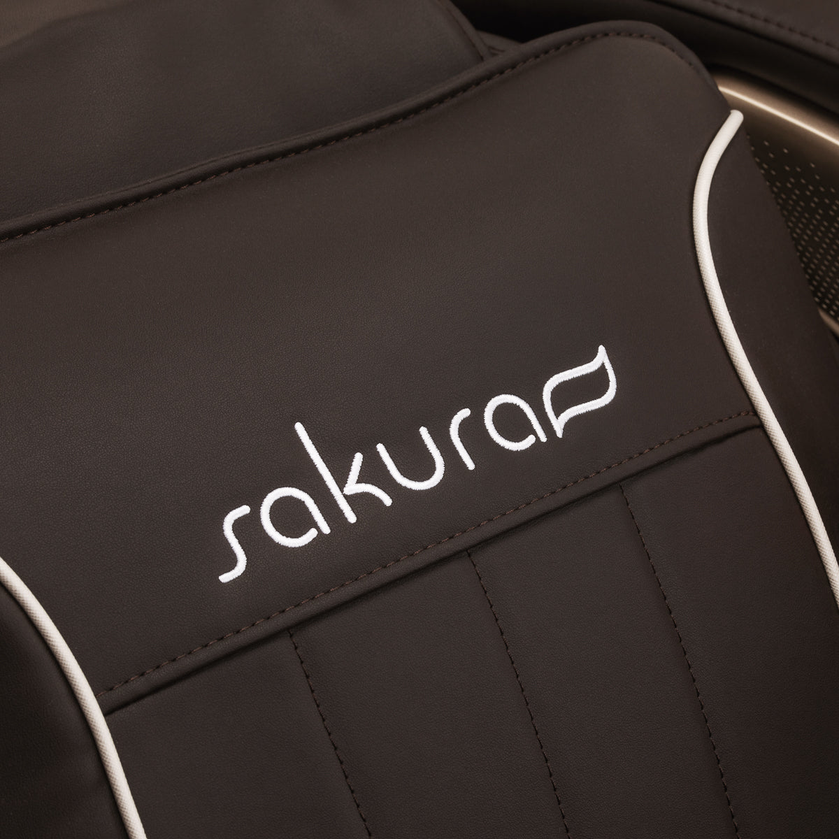 Sakura Comfort Plus 806 Massage Chair Brown - close-up of the upholstery and construction details