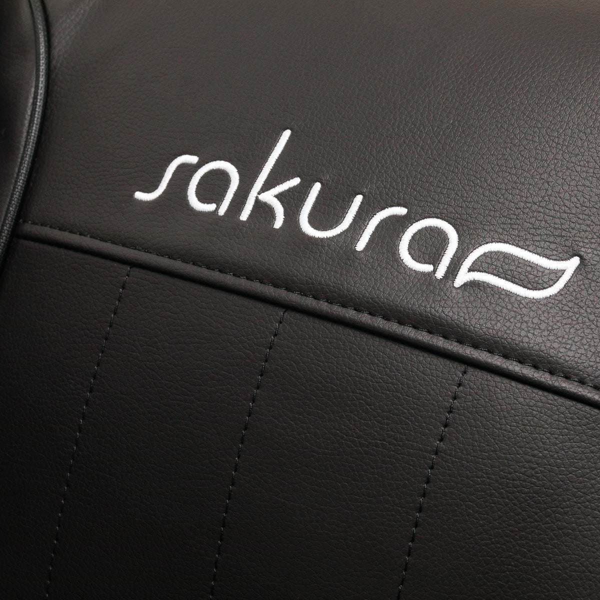 Sakura Massage Chair Comfort Plus 806 Black - close-up of the upholstery and construction details