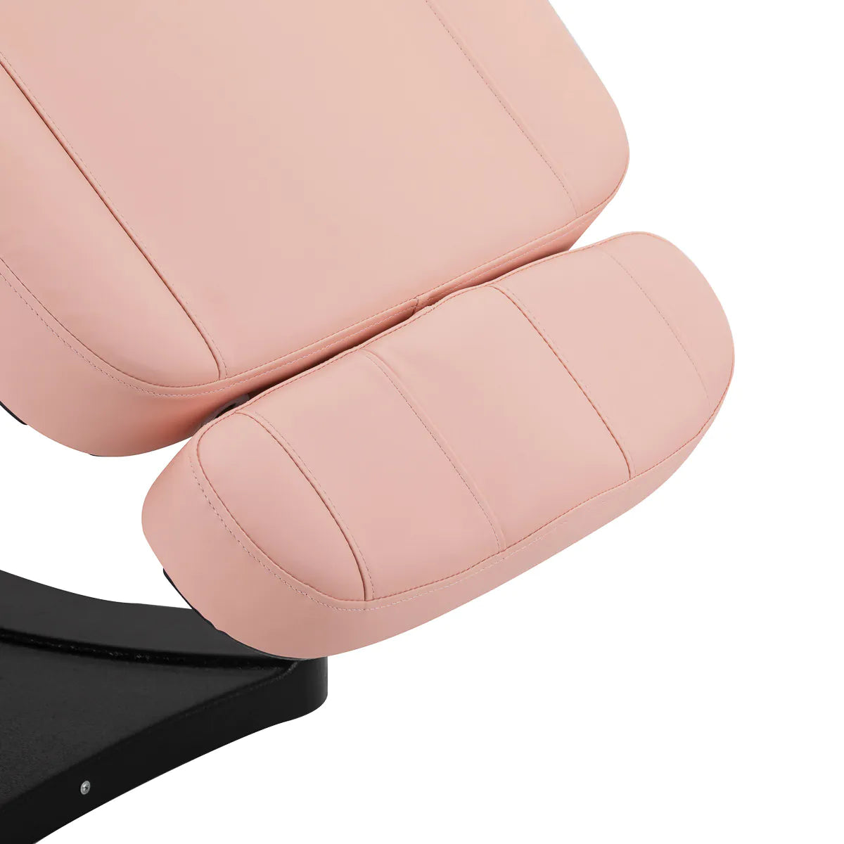 Close-up of the footrest on the Sillon Electric Cosmetic Chair Classic in pink, showcasing padded comfort and adjustability.