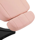 Close-up of the footrest on the Sillon Electric Cosmetic Chair Classic in pink, showcasing padded comfort and adjustability.