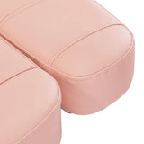Detailed view of the padded seat on the Sillon Electric Cosmetic Chair Classic in pink, ensuring client comfort during use.