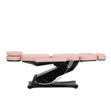 Fully reclined position of the Sillon Electric Cosmetic Chair Classic in pink, designed for maximum comfort during treatments.