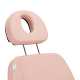 Adjustable headrest with extended support on the Sillon Electric Cosmetic Chair Classic in pink for enhanced client comfort.