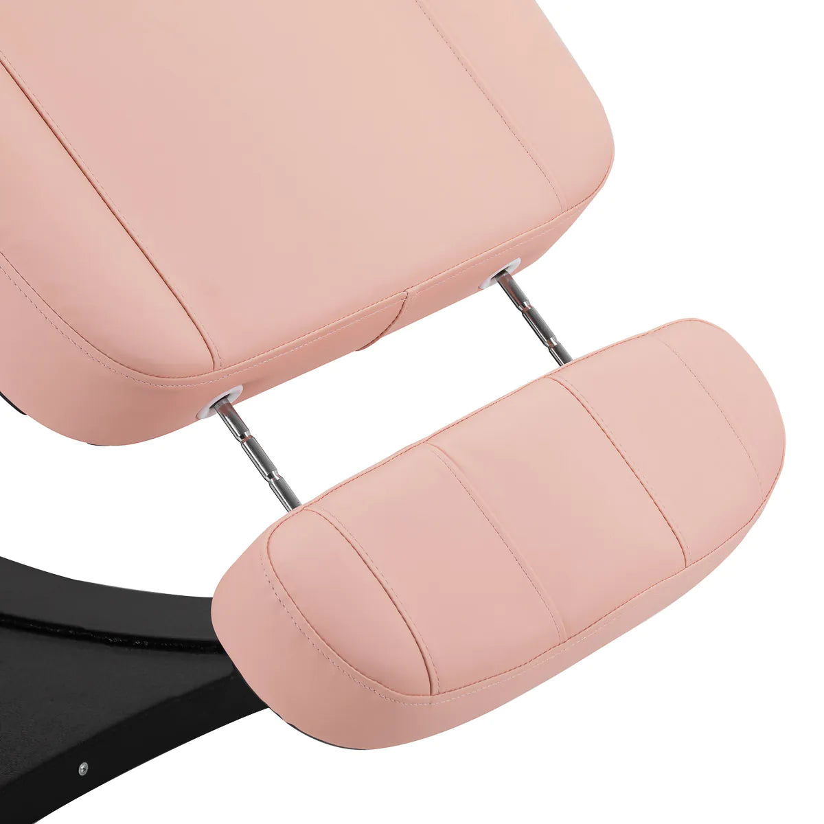 Extended footrest on the Sillon Electric Cosmetic Chair Classic in pink, designed for customizable client positioning.