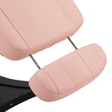 Extended footrest on the Sillon Electric Cosmetic Chair Classic in pink, designed for customizable client positioning.