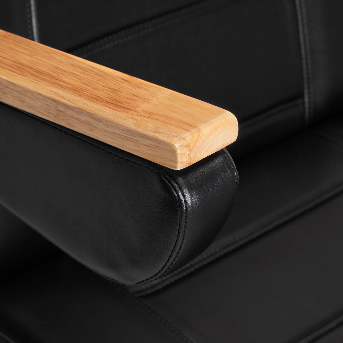 Sillon Lux 273B 3-Motor Electric Beauty Bed Black - close-up of the upholstery and construction details