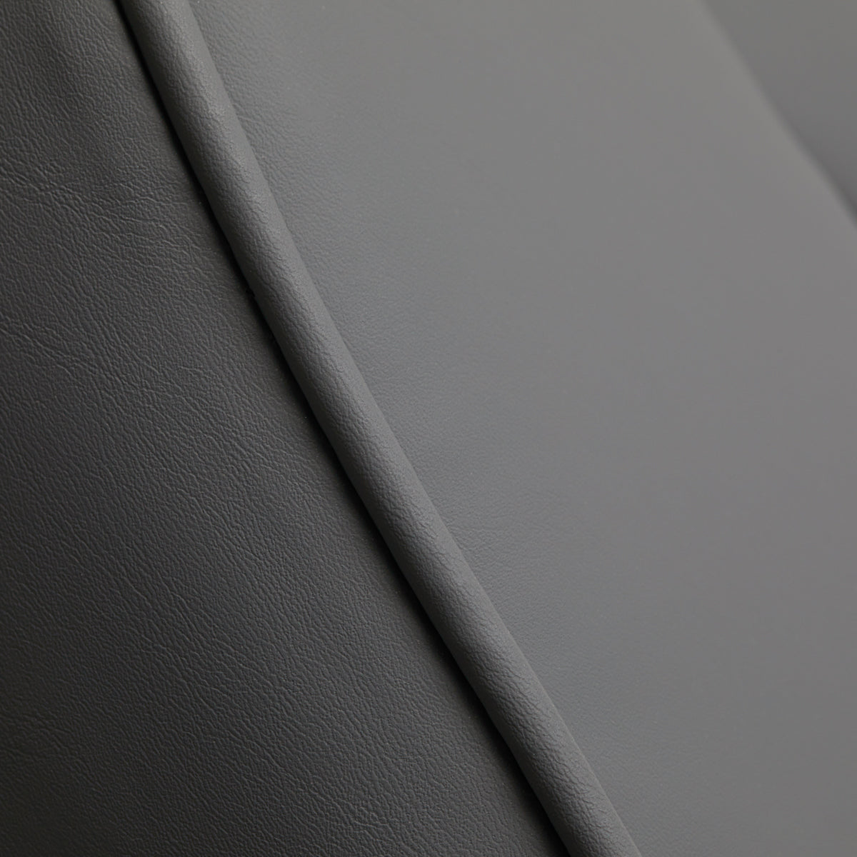 Sillon Lux 273B 3-Motor Electric Beauty Bed Grey - close-up of the upholstery and construction details