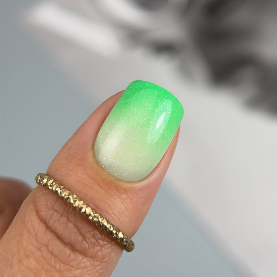 Slowianka Baby Boomer in Spray Pistachio - product colour and packaging on a dark background