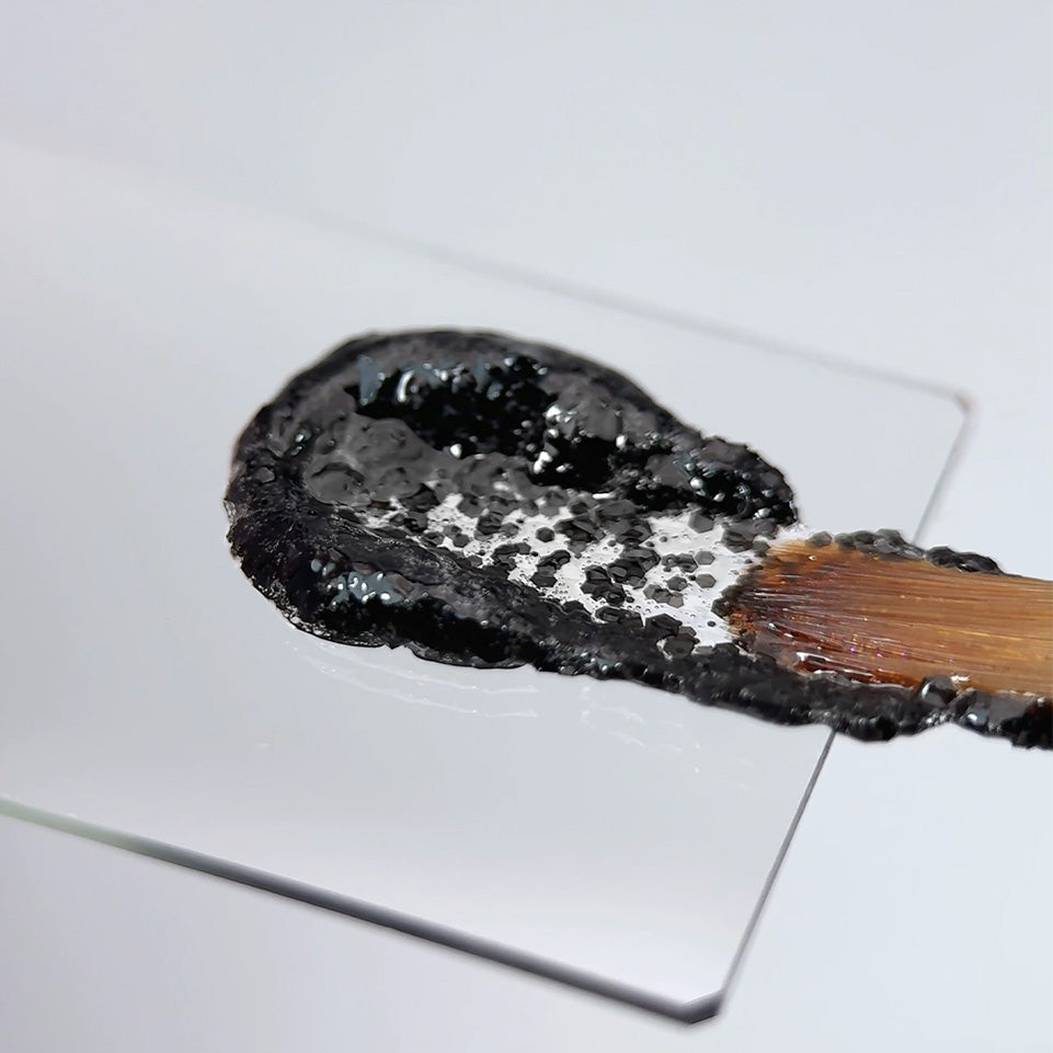 Slowianka Black Snow Powder Dust - product colour and packaging on a dark background