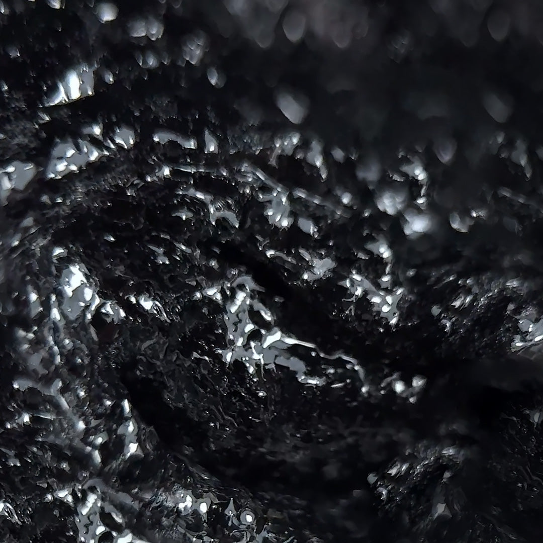 Slowianka Black Snow Powder Dust - product colour and packaging on a dark background