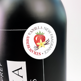 Slowianka Cleaner Strawberry & Vanilla - product displayed with its packaging on a dark background