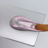 Slowianka Tiny Pink Holo Decoration Powder Dust - product colour and packaging on a dark background