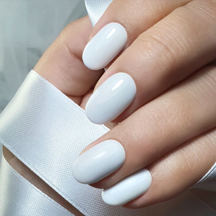 Slowianka Top Coat Gloss Pro White Defense - colour shown on manicured nails