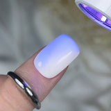 Slowianka Top Coat Gloss Pro White Defense - product colour and packaging on a dark background