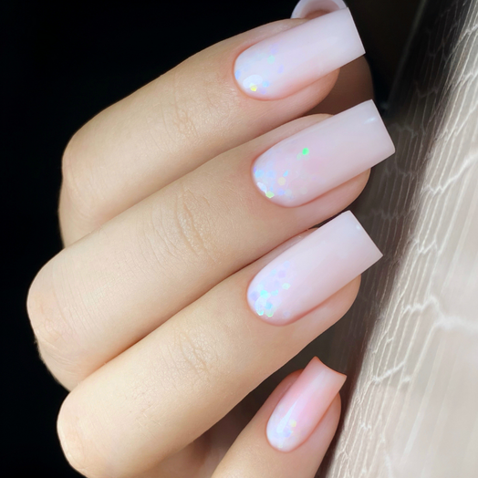 Slowianka Top Coat Milky - colour shown on manicured nails