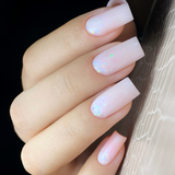 Slowianka Top Coat Milky - colour shown on manicured nails
