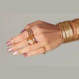 Manicure finished with Victoria Vynn 486 Cat Eye Travertine warm brown-beige magnetic shimmer