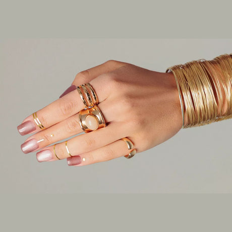 Manicure finished with Victoria Vynn 486 Cat Eye Travertine warm brown-beige magnetic shimmer