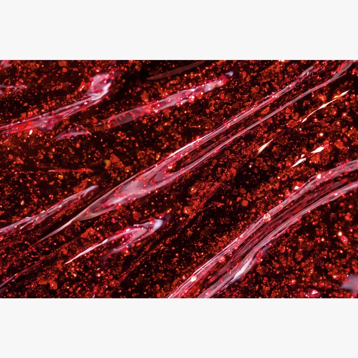 Close-up swatch of Victoria Vynn 482 Red Marble ruby-red glitter gel polish