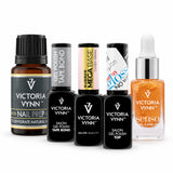 Five Victoria Vynn manicure products on white: Salon Nail Prep, Tape Bond, Mega Base Cover Cream, OH! My Gloss and orange Senso Follow Me cuticle oil.