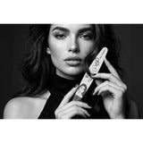 Model holding a Victoria Vynn Nail Therapist 150/150 oval nail file