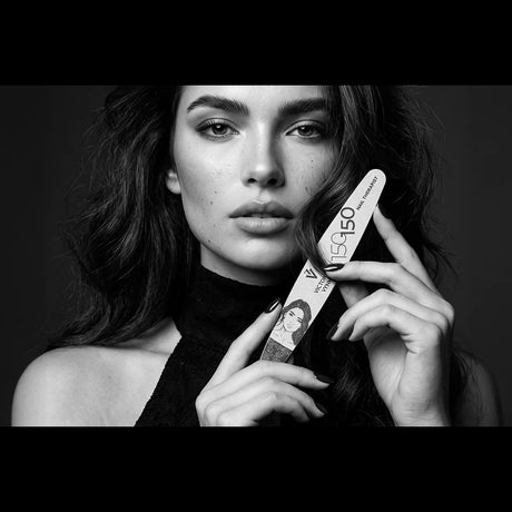 Model holding the Victoria Vynn Nail Therapist ellipse file marked 150/150