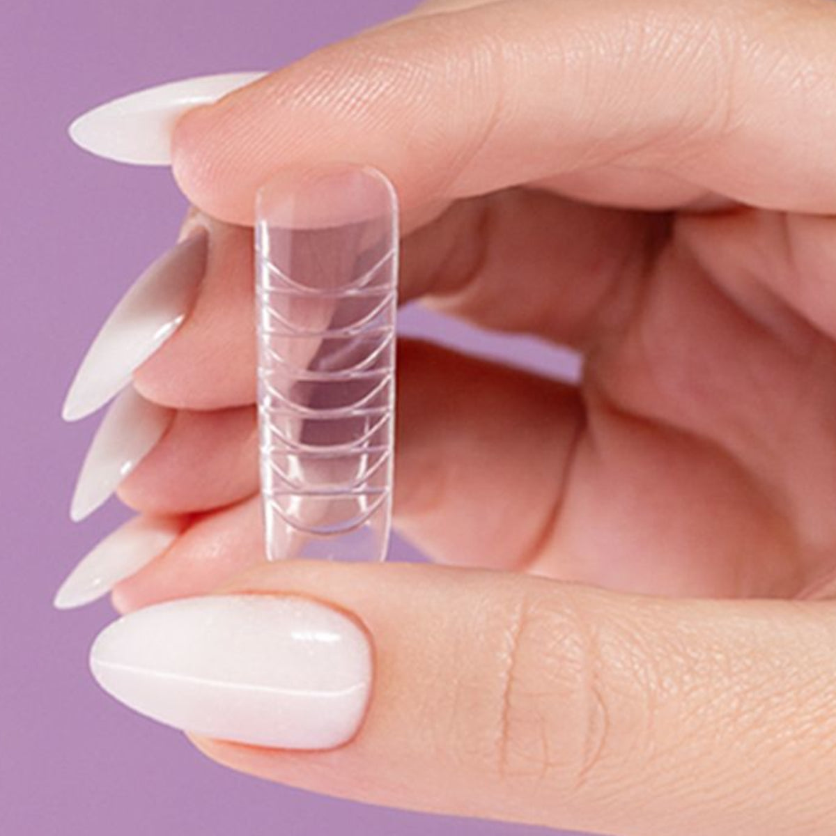 Victoria Vynn Perfect Shape Dual Forms Universal - nail form shown in use during nail extension application
