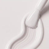 Victoria Vynn Pure Vegan Mani & Pedi Base Milky - product colour and packaging on a dark background