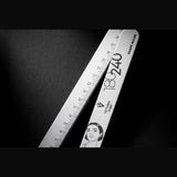 Victoria Vynn Shape Ruler 180/240 file beside its centimetre ruler edge on a black background