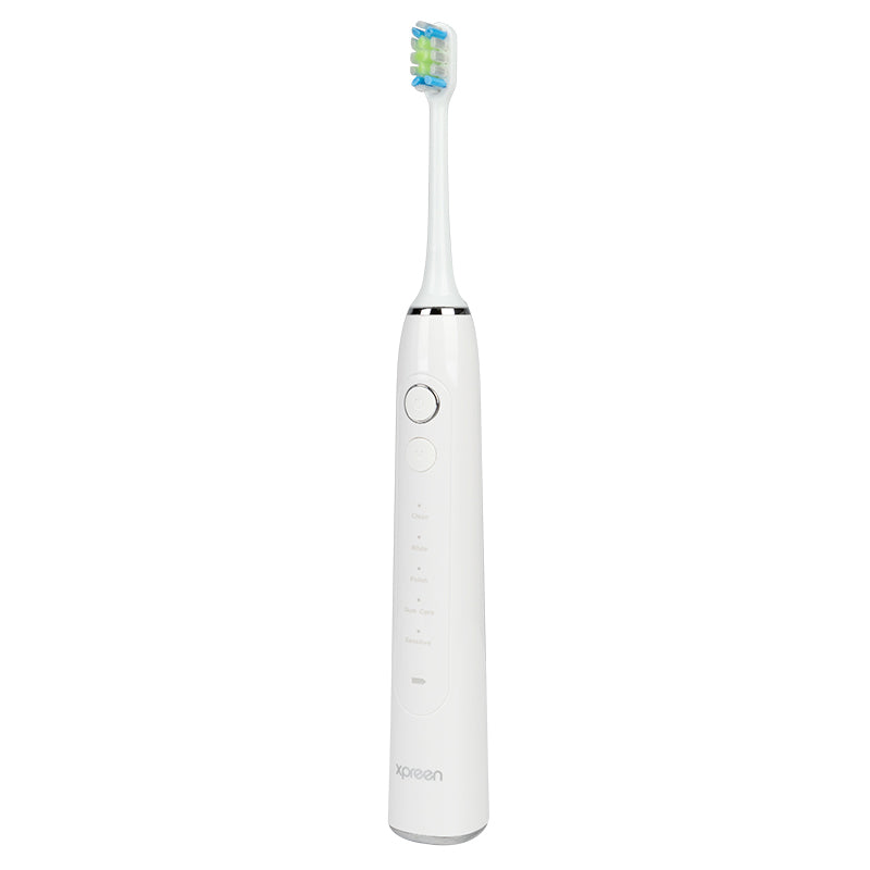 Xpreen Sonic Toothbrush - arranged with the included components on a white background
