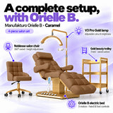 Manufakturo Orielle B Caramel four-piece salon set features: treatment bed, matching salon chair, V3 Pro Gold lamp and gold three-tier beauty trolley.