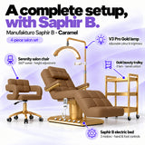Manufakturo Saphir version B Caramel four-piece salon set features: treatment bed, matching salon chair, V3 Pro Gold lamp and gold three-tier beauty trolley.